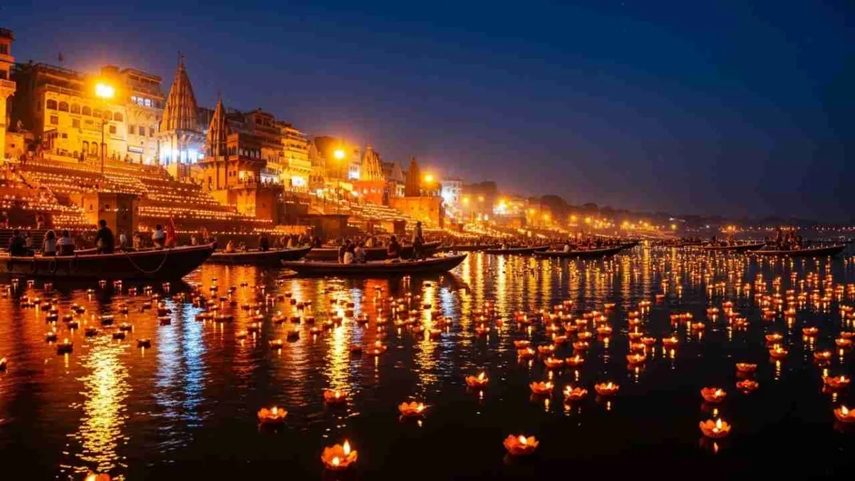 Many floating diyas glowing on the water